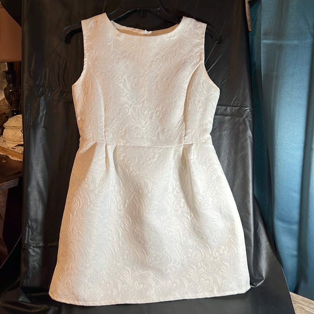 Simple white dress.